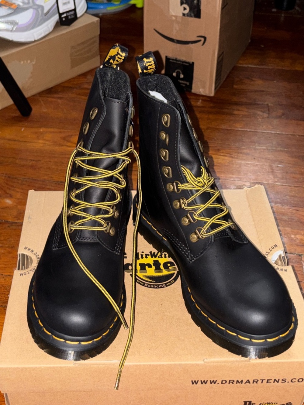 Dr. Martens Black Leather 8-Eye Boots with Yellow Accents